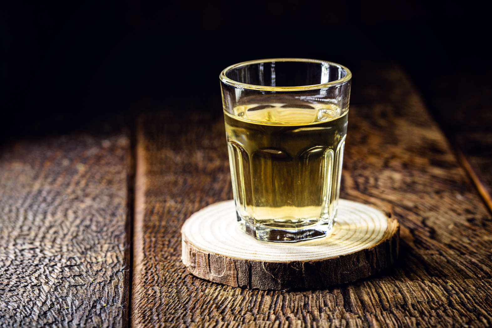 small glass of Brazilian cachaça, cachaça day, known as pinga in brazil. Distilled cane-based drink.